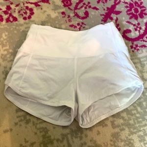 white lululemon high rise speed up shorts